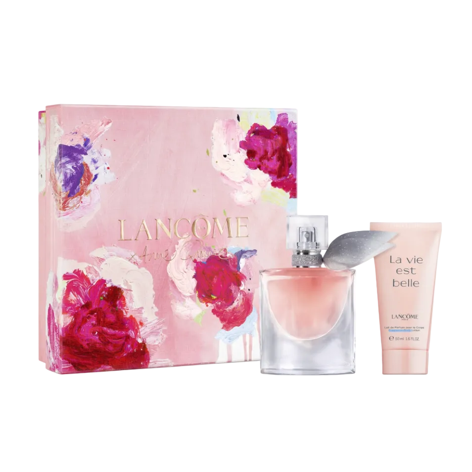 Lancôme La Vie Est Belle perfume, body lotion and shower gel beside a rose-patterned gift box