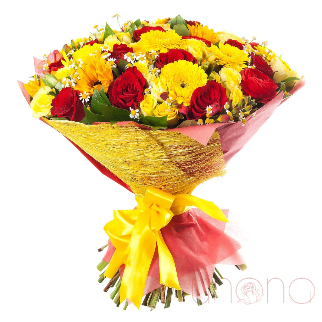 A Feast of Colour Bouquet — red & yellow roses, gerberas, sunflowers & chamomile with golden wrap, flower delivery to Ukrain