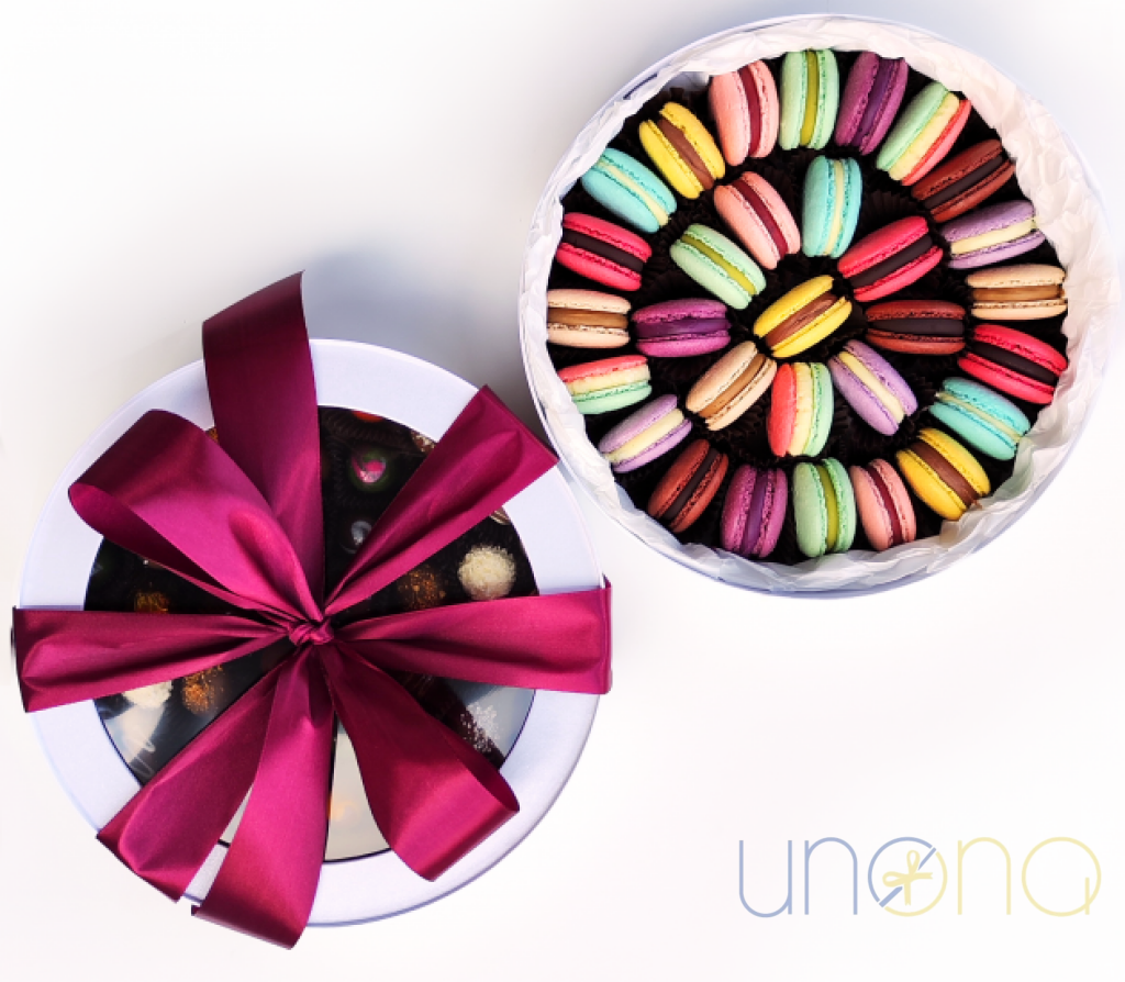 Assorted French macarons in elegant gift packaging