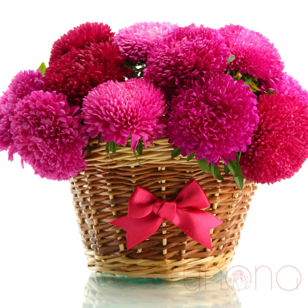 Basket of pink and red asters – flower delivery Ukraine
