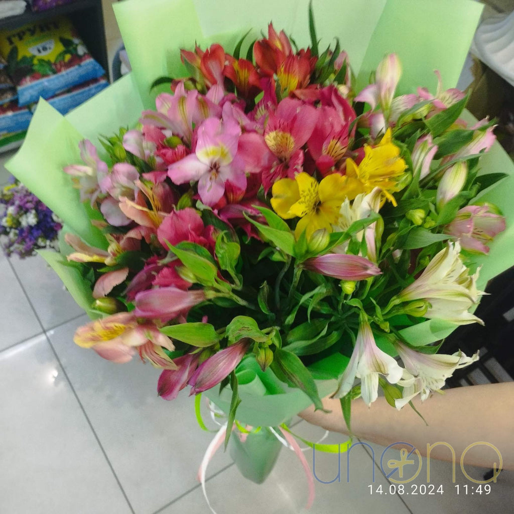 Fresh alstroemerias bouquet with 11 stems wrapped in paper