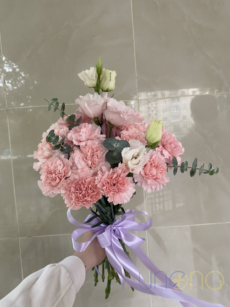 Curly carnation flowers with ruffled petals in elegant bouquet