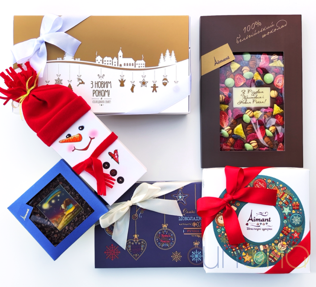 Merry Christmas luxury gift box with macarons, and artisan chocolates