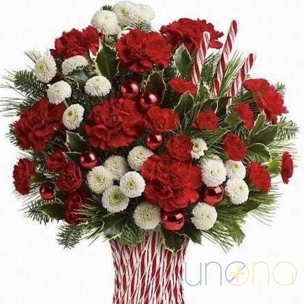 Christmas Story Bouquet with red carnations, white chrysanthemums and pine greenery