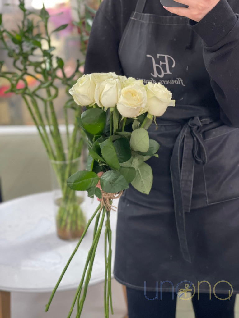 Elegant arrangement of 9 fresh roses in Dnipro Ukraine