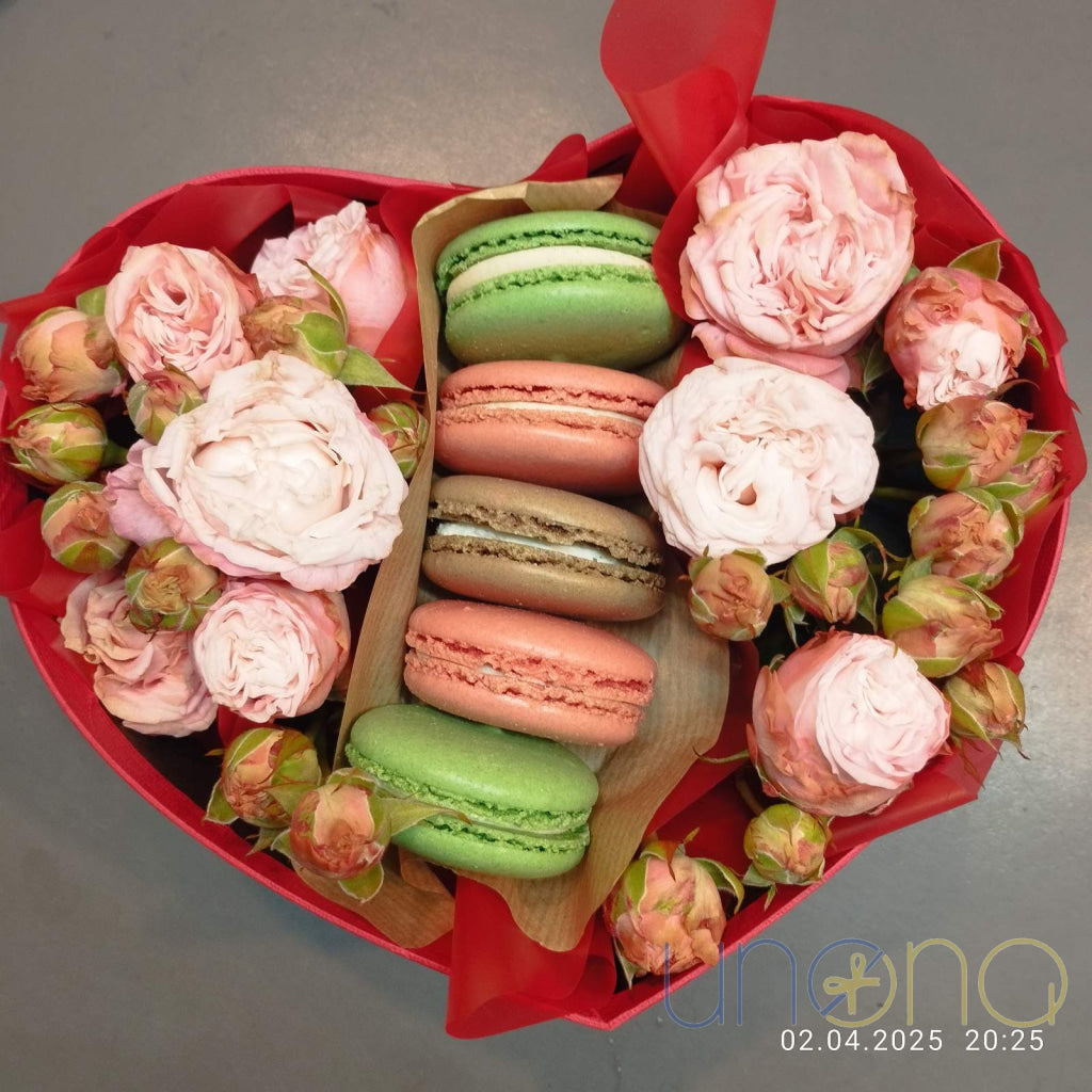 Elegant heart-shaped surprise with flowers and macarons