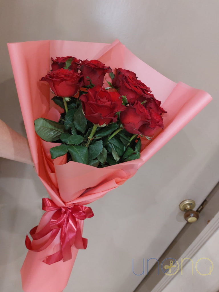 Elegant arrangement of 9 fabulous red roses delivered in Odesa Ukraine