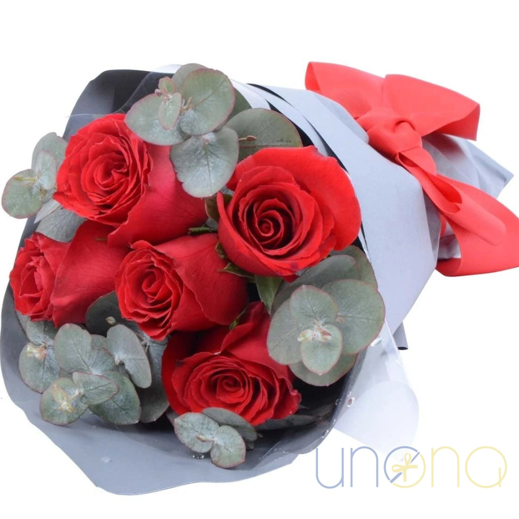Elegant rose and eucalyptus arrangement delivery in Ukraine