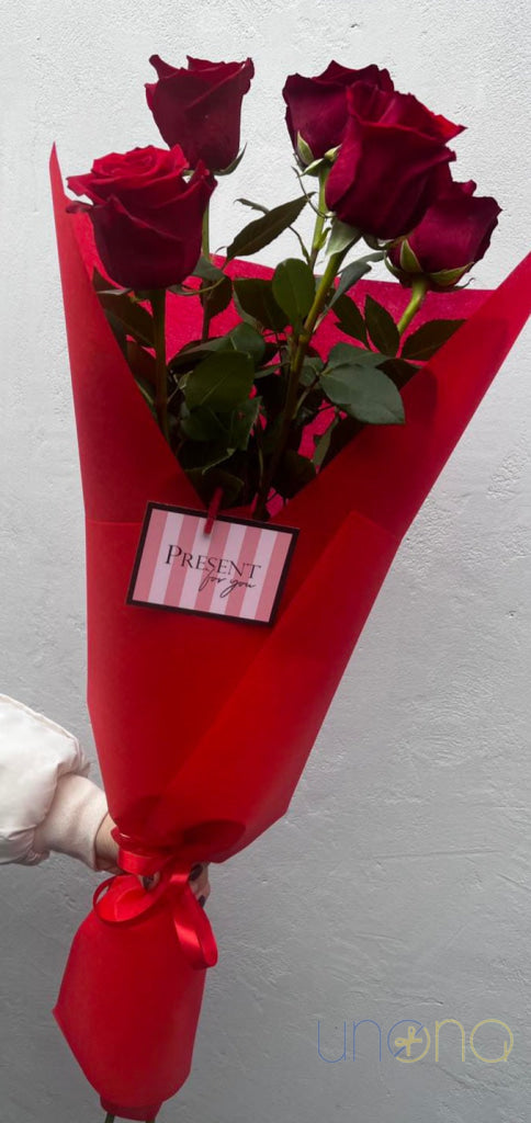 Fresh roses delivery surprise for a woman in Ukraine