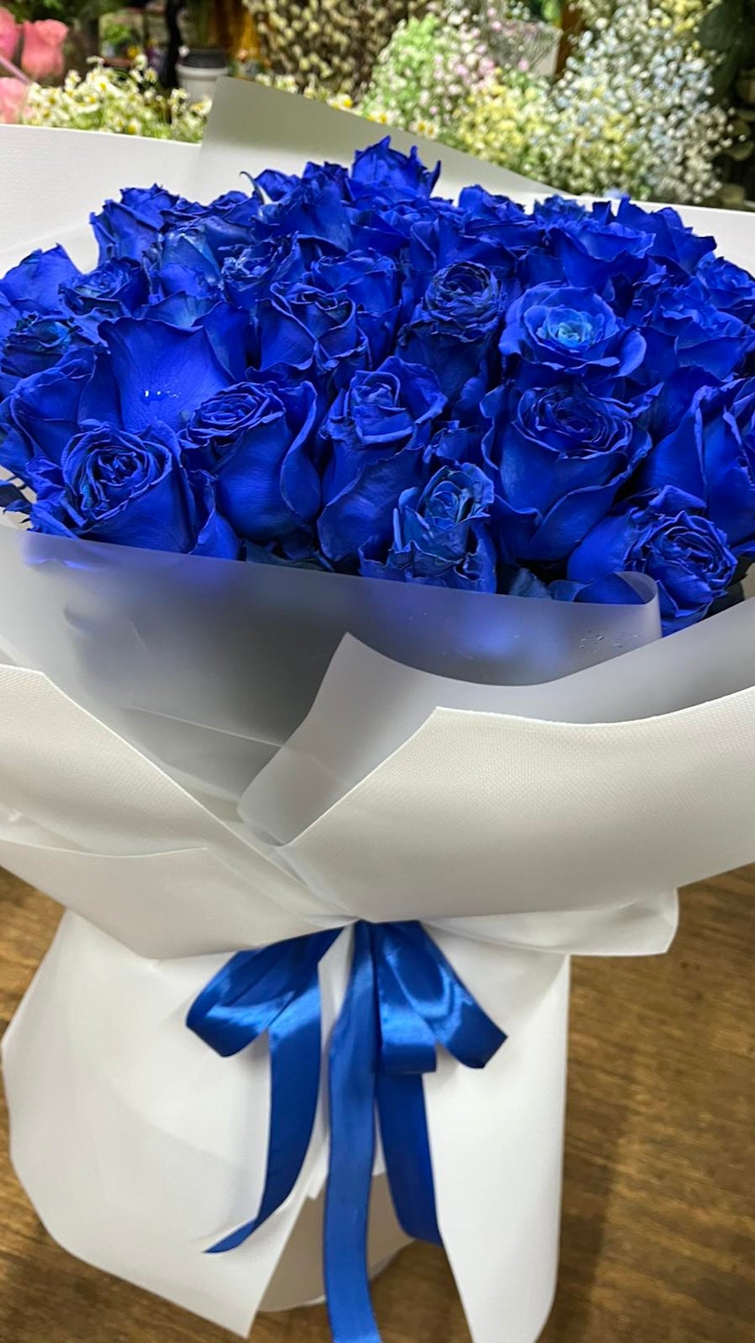 Bouquet de 19 roses bleues