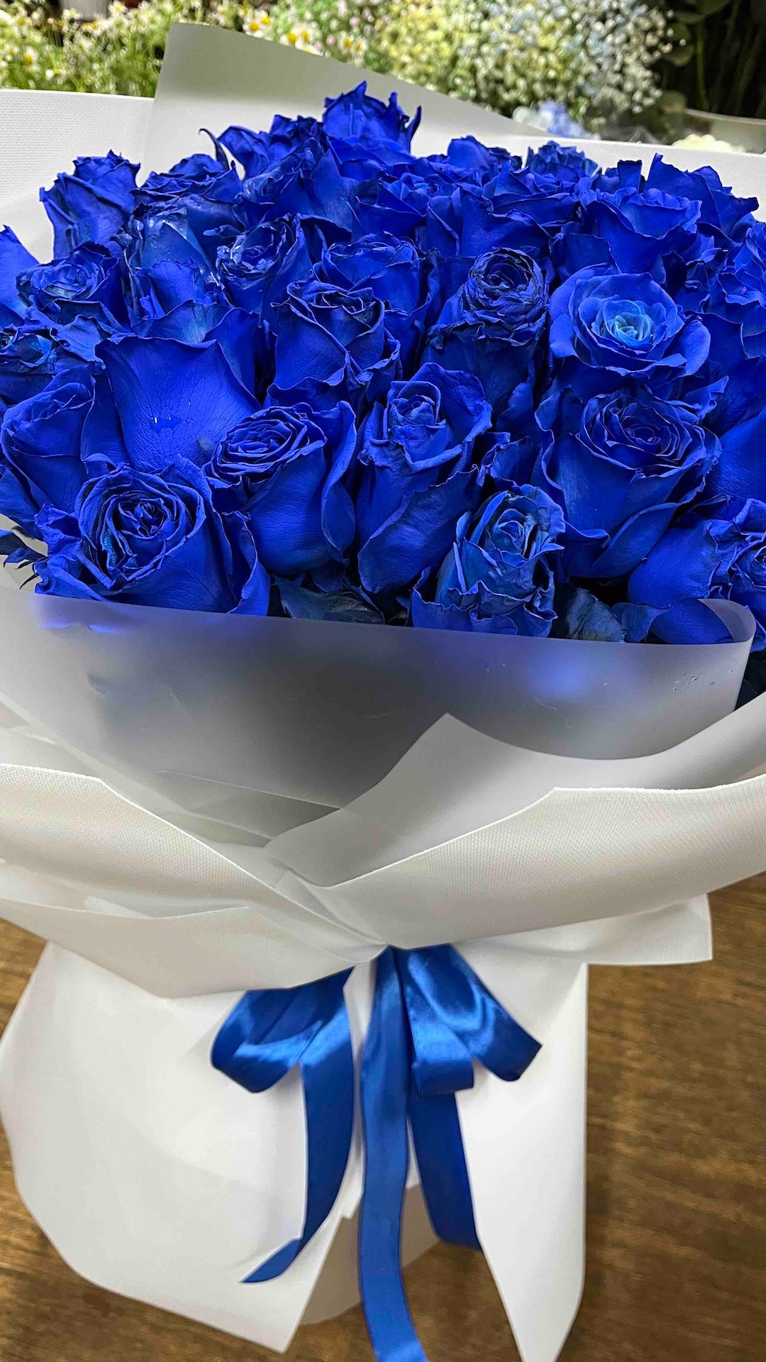 Bouquet de 19 roses bleues