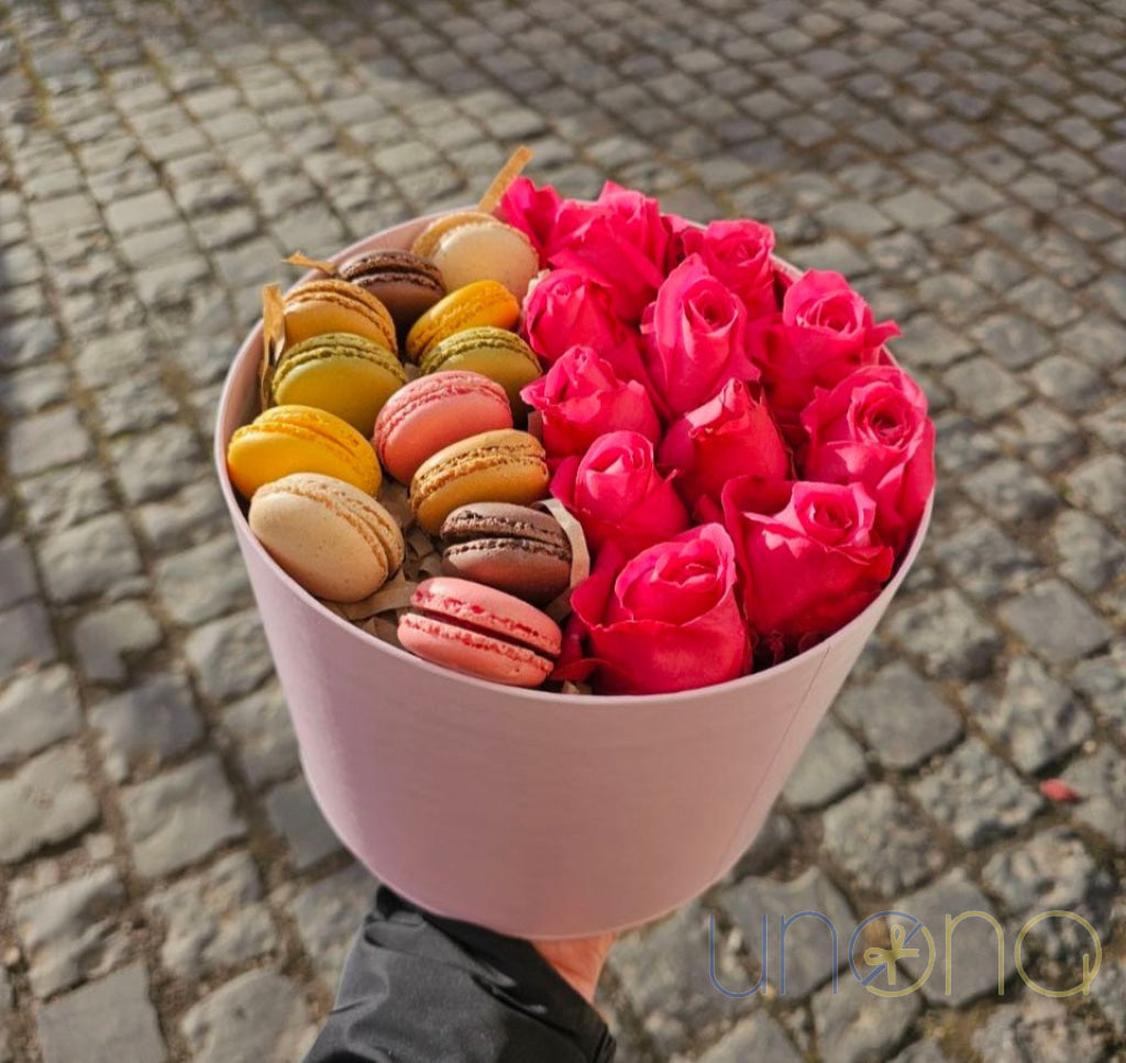 Pink roses and artisan French macarons arrangement