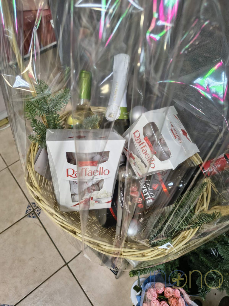 Premium wine and sweets basket with Raffaello chocolates and elegant presentation