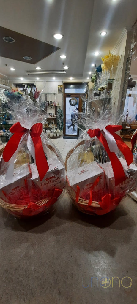 Premium Raffaello chocolate and wine gift set in a wicker basket with red ribbon
