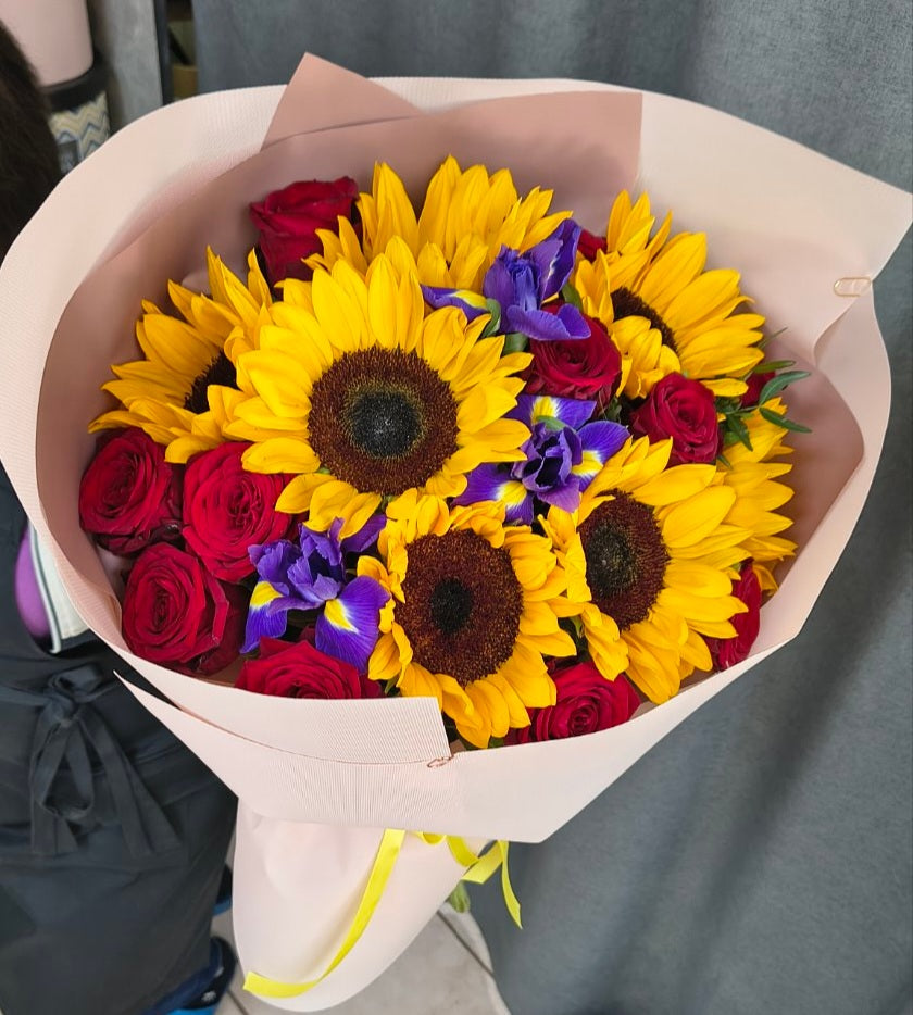 Red rose and yellow sunflower bouquet arranged in Ukraine