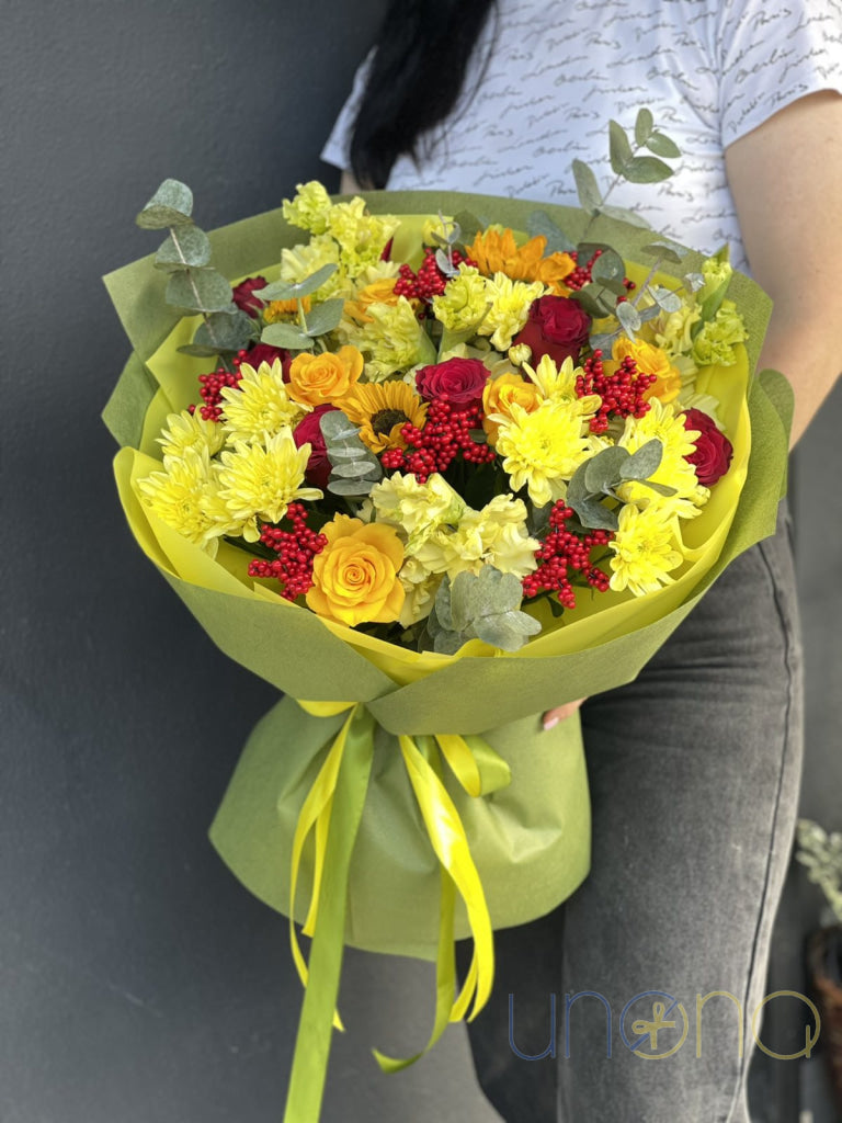 Red and yellow roses with fresh chrysanthemums