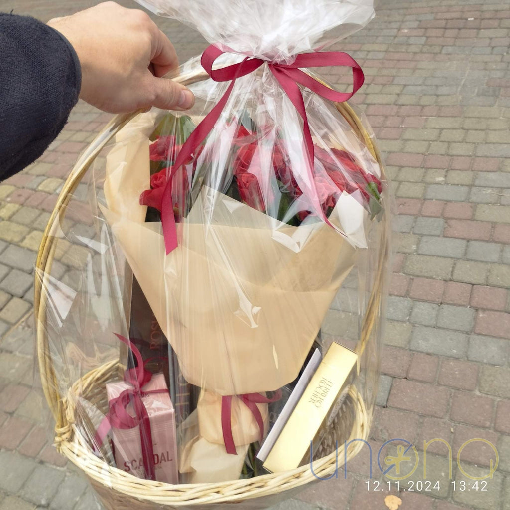 Luxury romantic gift basket with red roses, sparkling wine and Ferrero Rocher chocolates