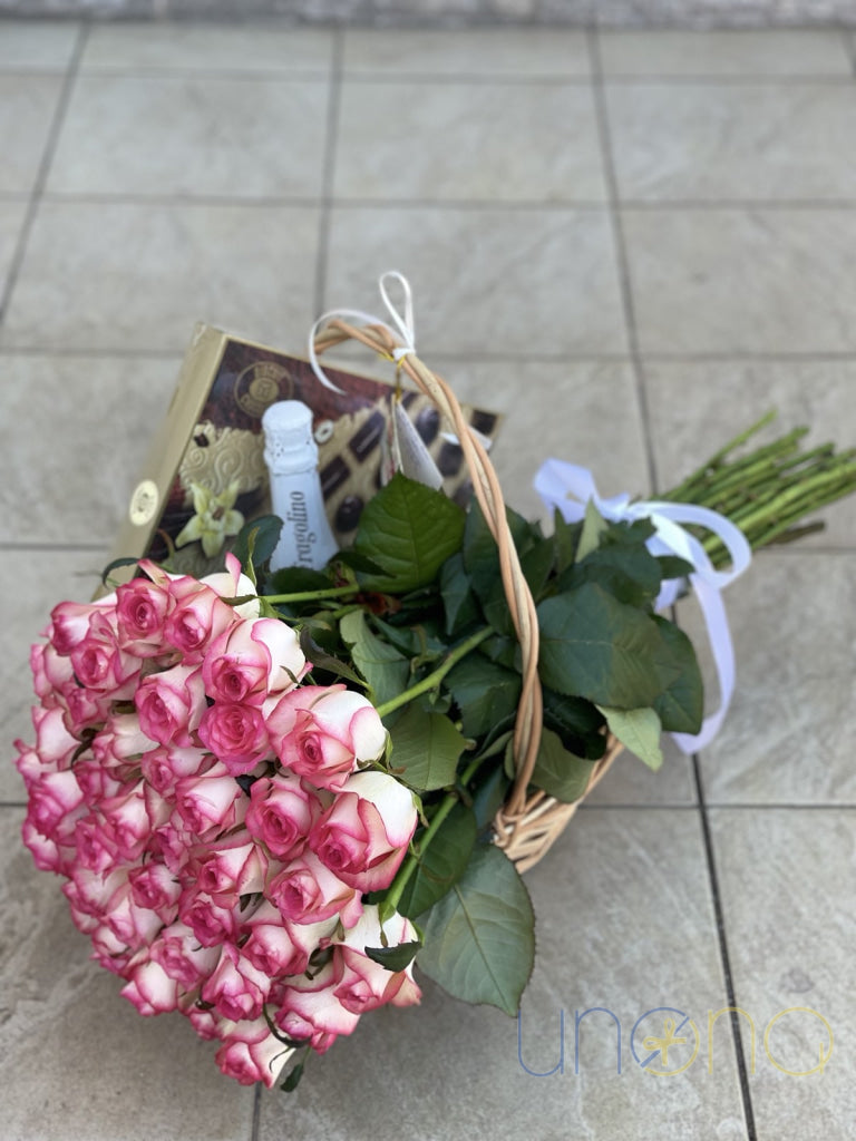 Romantic gift basket with roses, champagne and chocolates delivered in Ukraine