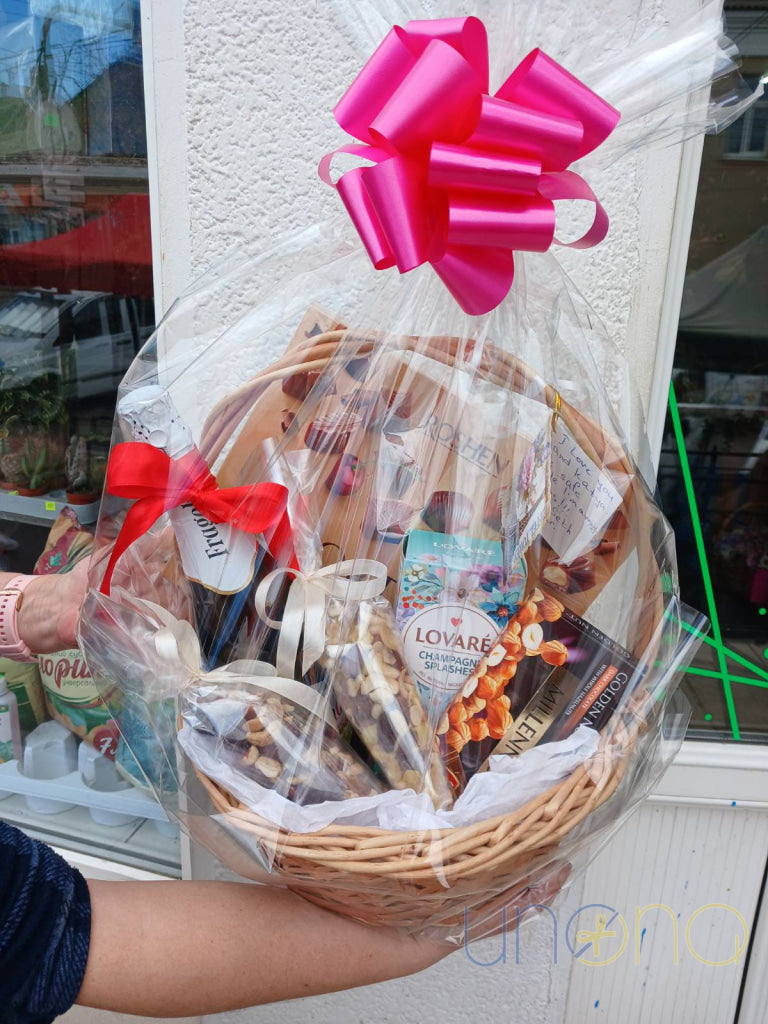 Luxury gift basket with roses, wine and sweet treats sent to Ukraine