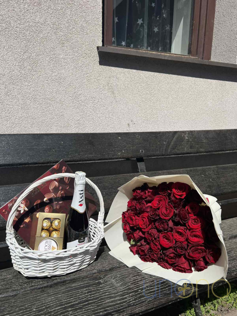 Elegant roses and chocolate gift basket sent to loved ones in Ukraine