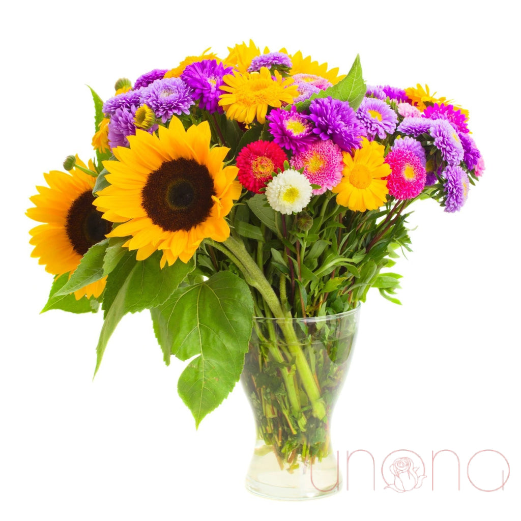 September flower bouquet with sunflowers, asters and chrysanthemums in Ukraine