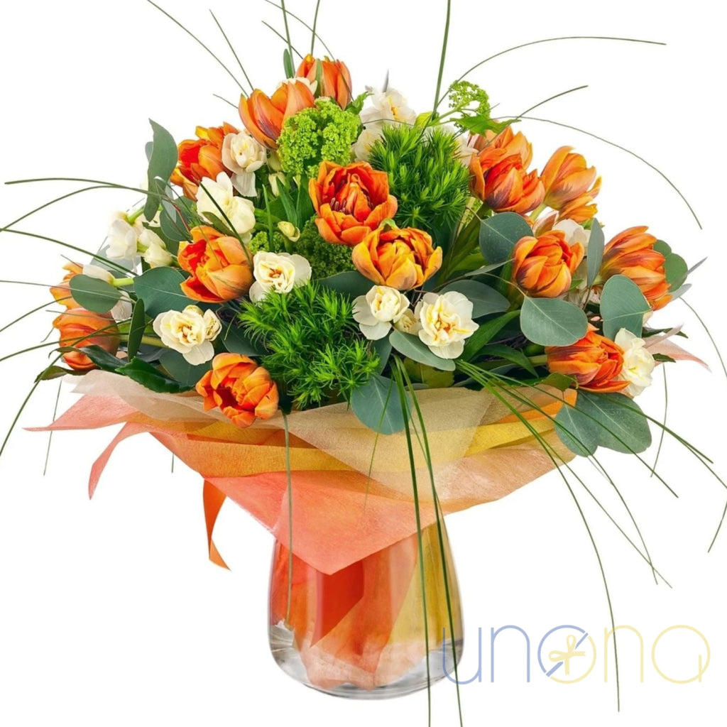 Bouquet with orange tulips and freesias in elegant wrapping – flower delivery Ukraine