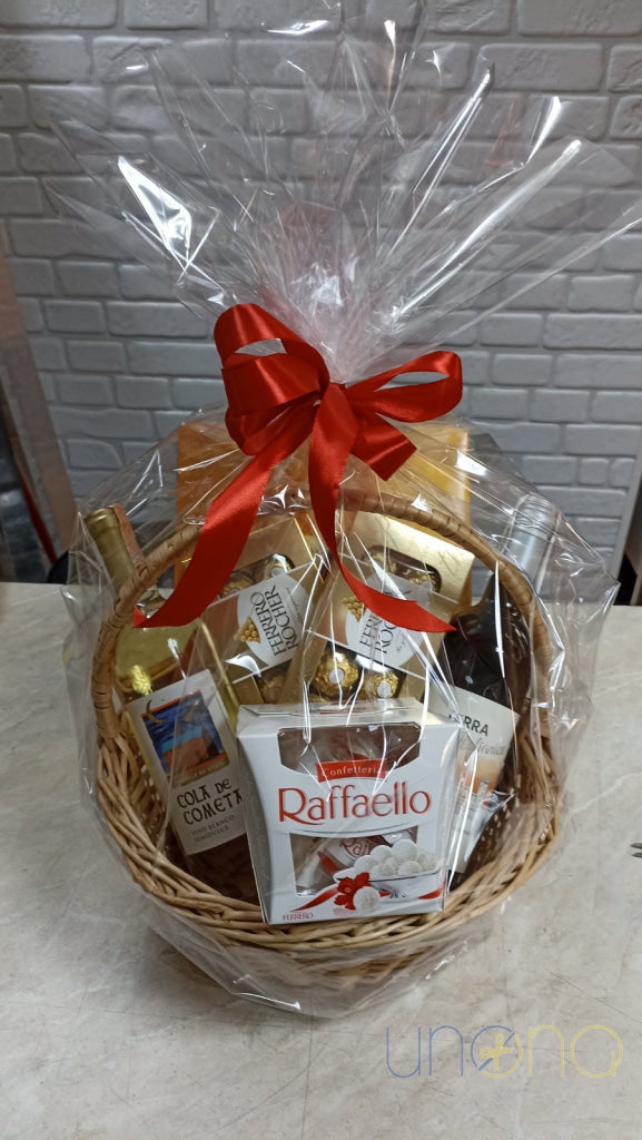 Sweet gift basket with wine, Ferrero Rocher, Raffaello and Kyiv Vechirny chocolates