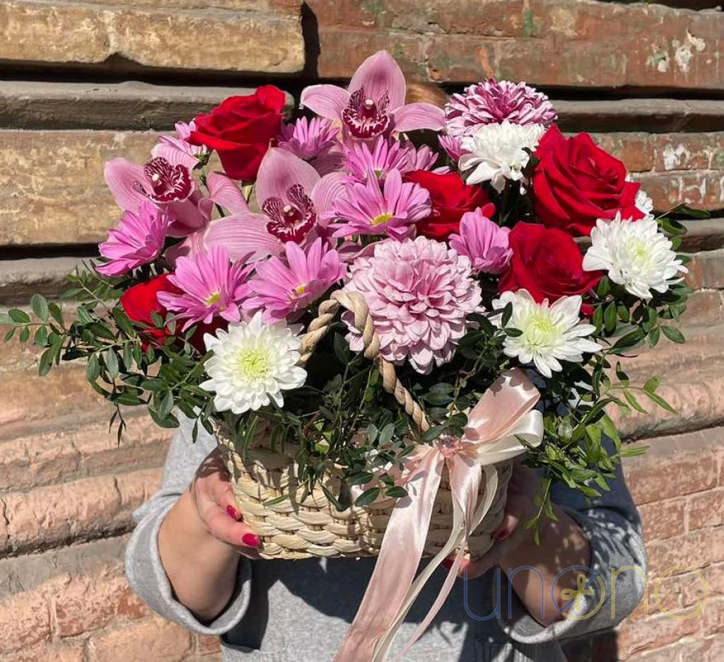 Surprise bouquet in wicker basket – send flowers to Kyiv, Ukraine