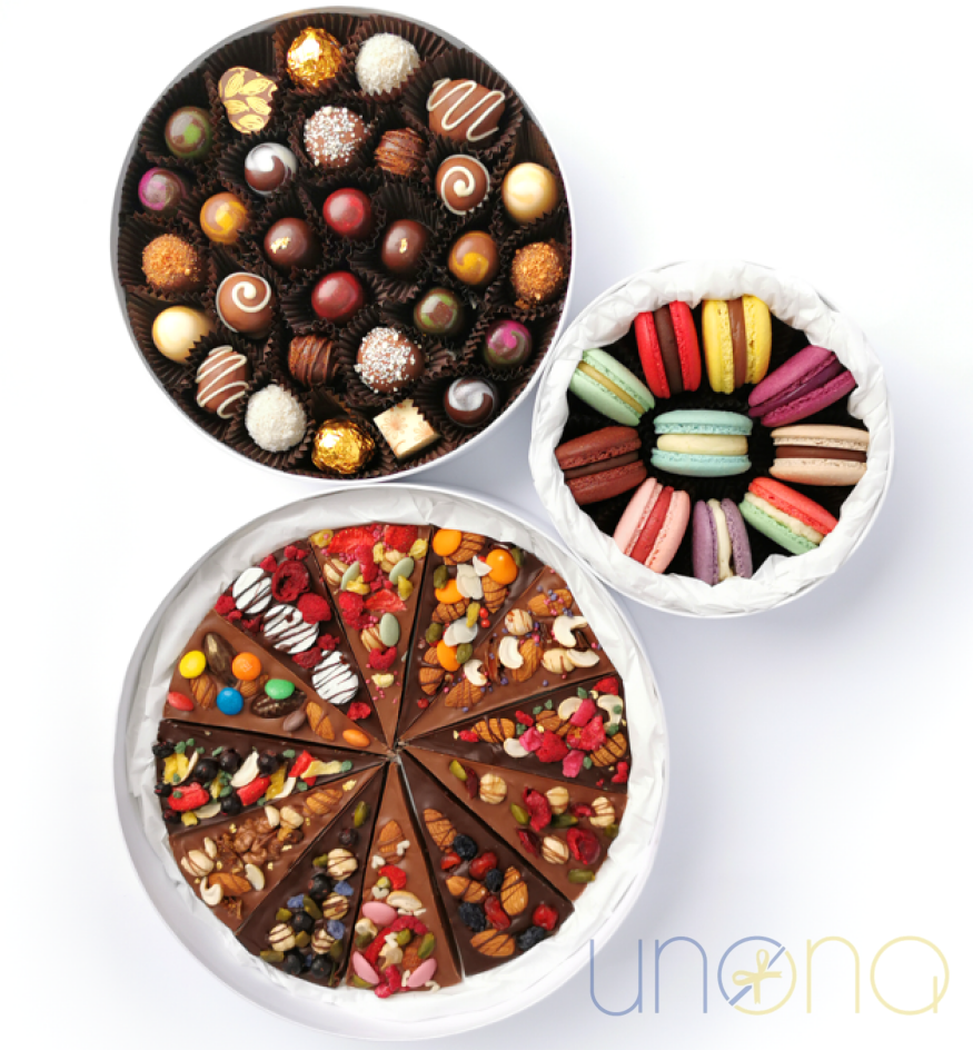 Tower of Love gift with chocolates, macarons, and chocolate pizza