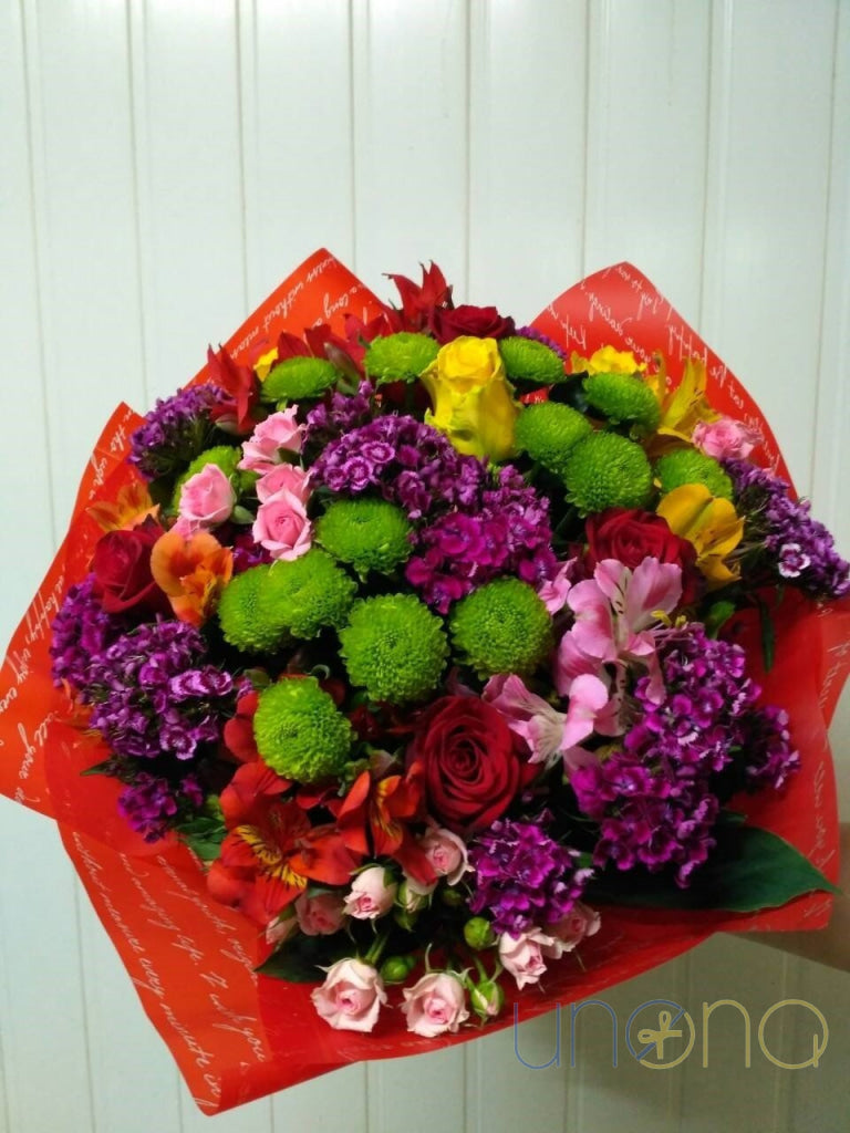 Colorful bouquet with chrysanthemums and roses to send to Ukraine