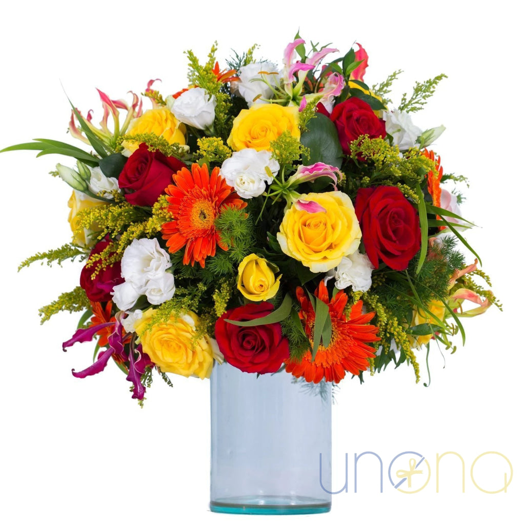 Vibrant Calorite Bouquet — red & yellow roses, orange gerberas, white eustomas & gloriosa lilies, flower delivery to Ukraine