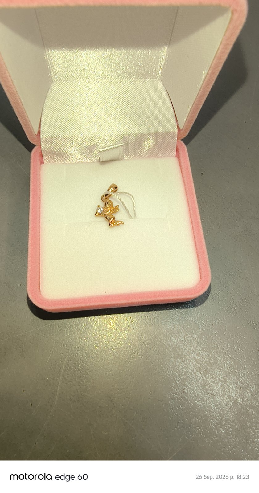 Pendentif en or doux ange