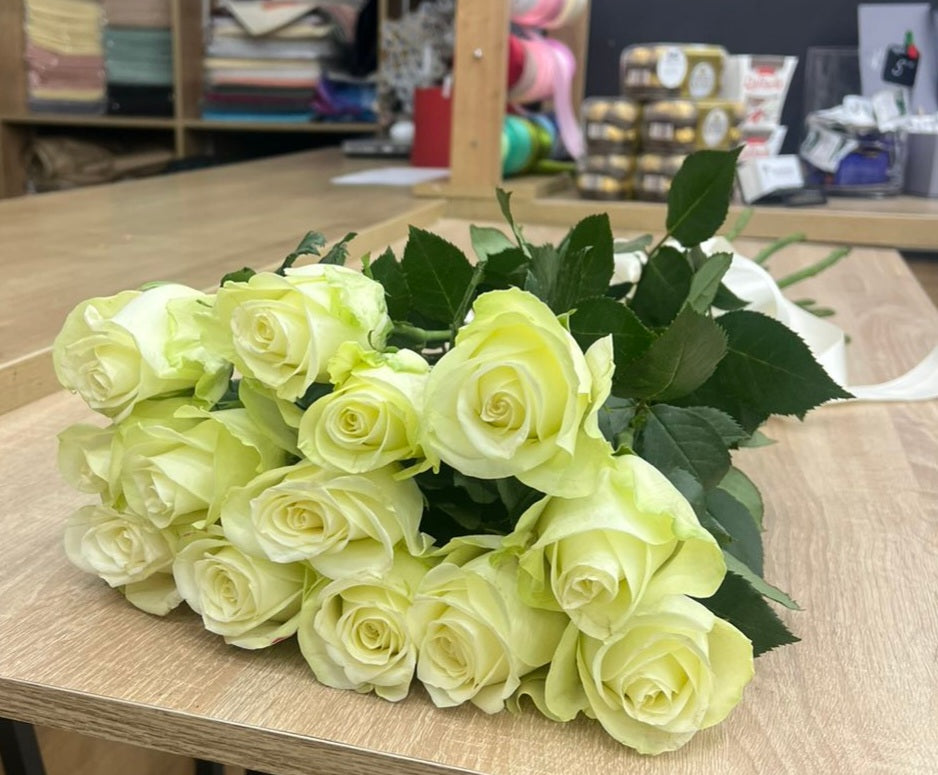 Tender Beauty – 13 Roses Bouquet Delivery in Ukraine