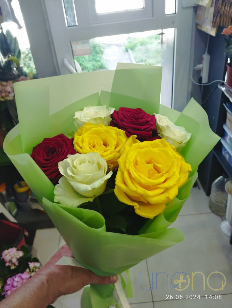 Luxury colorful roses hand arranged with care