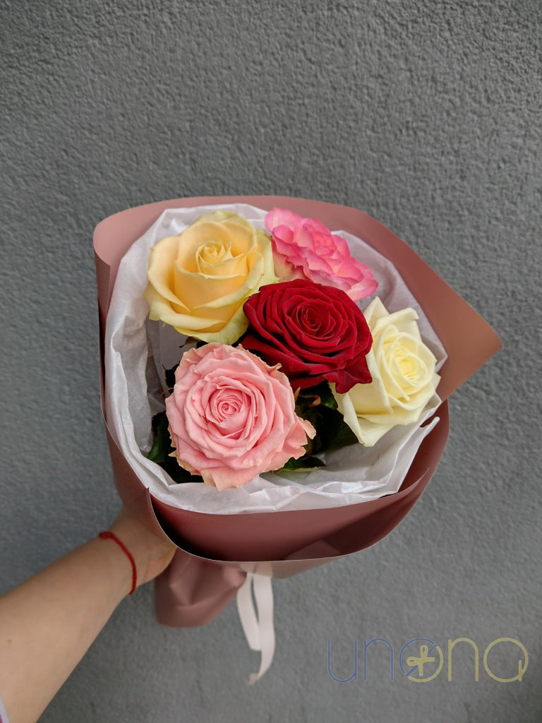 Complimentary gift wrapped multicolored rose bouquet delivery in Ukraine