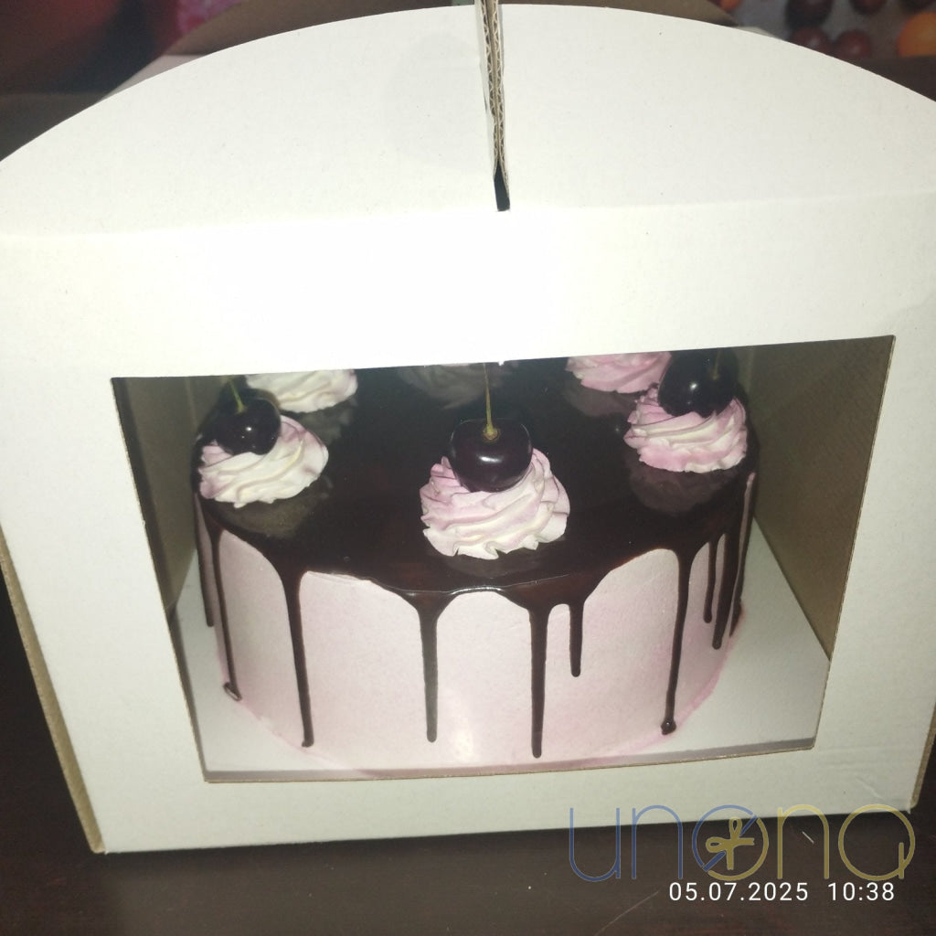 Black Forest birthday cake with chocolate sponge and fresh cherries