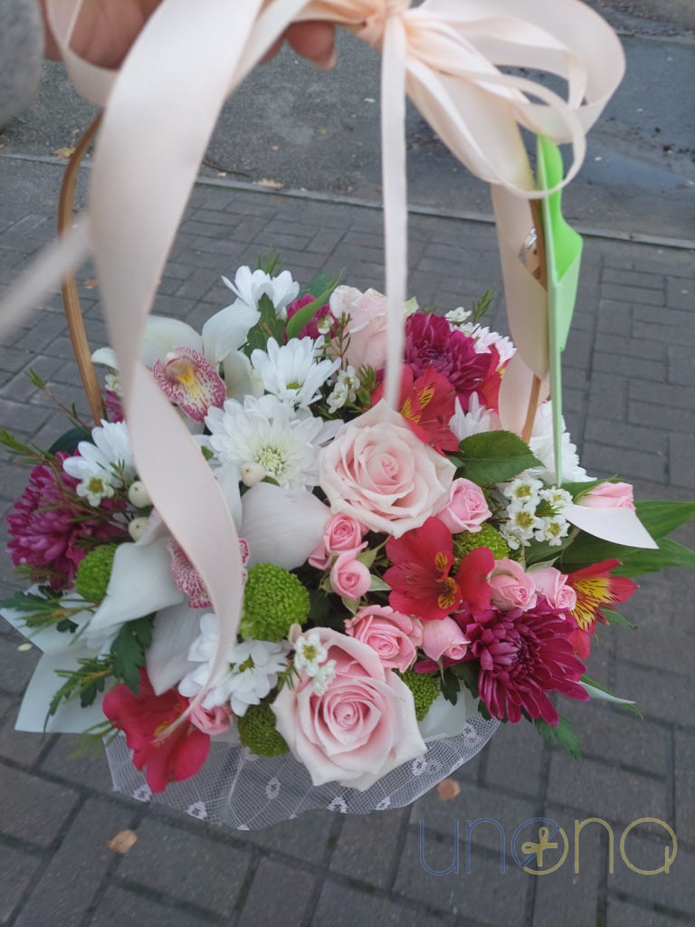 Birthday flower basket with roses chrysanthemums and orchids