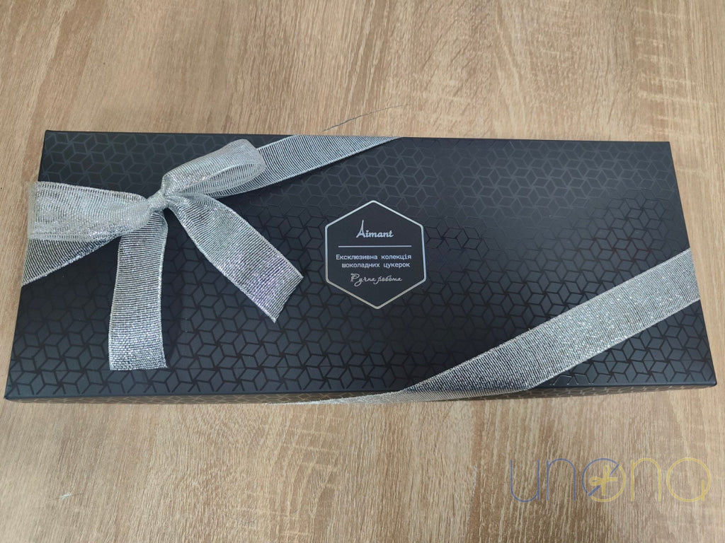 Black luxury gift box filled with 27 handmade Belgian chocolates
