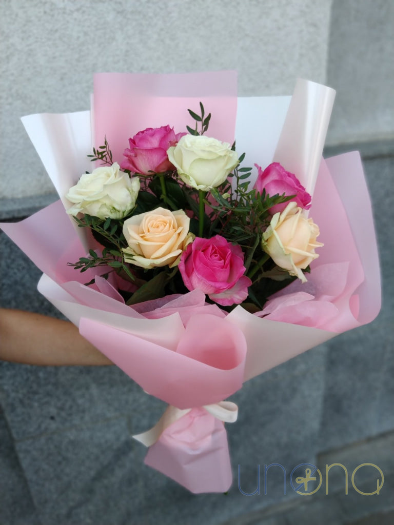 Fresh bouquet of 7 colorful roses hand delivered in Ukraine