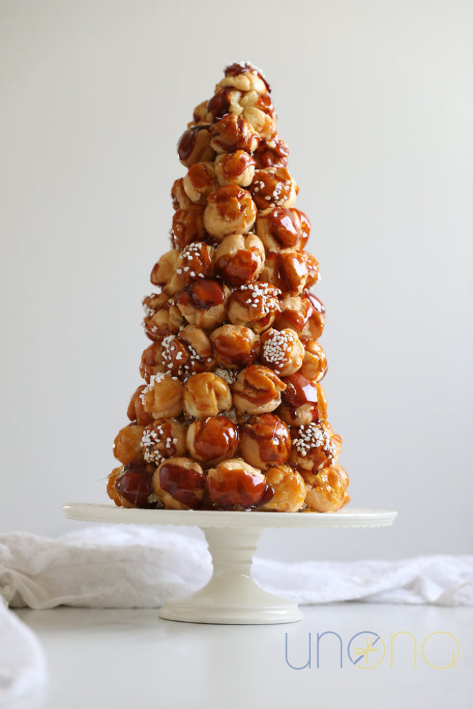 Elegant Croquembouche tower handcrafted by Ukrainian pastry chefs