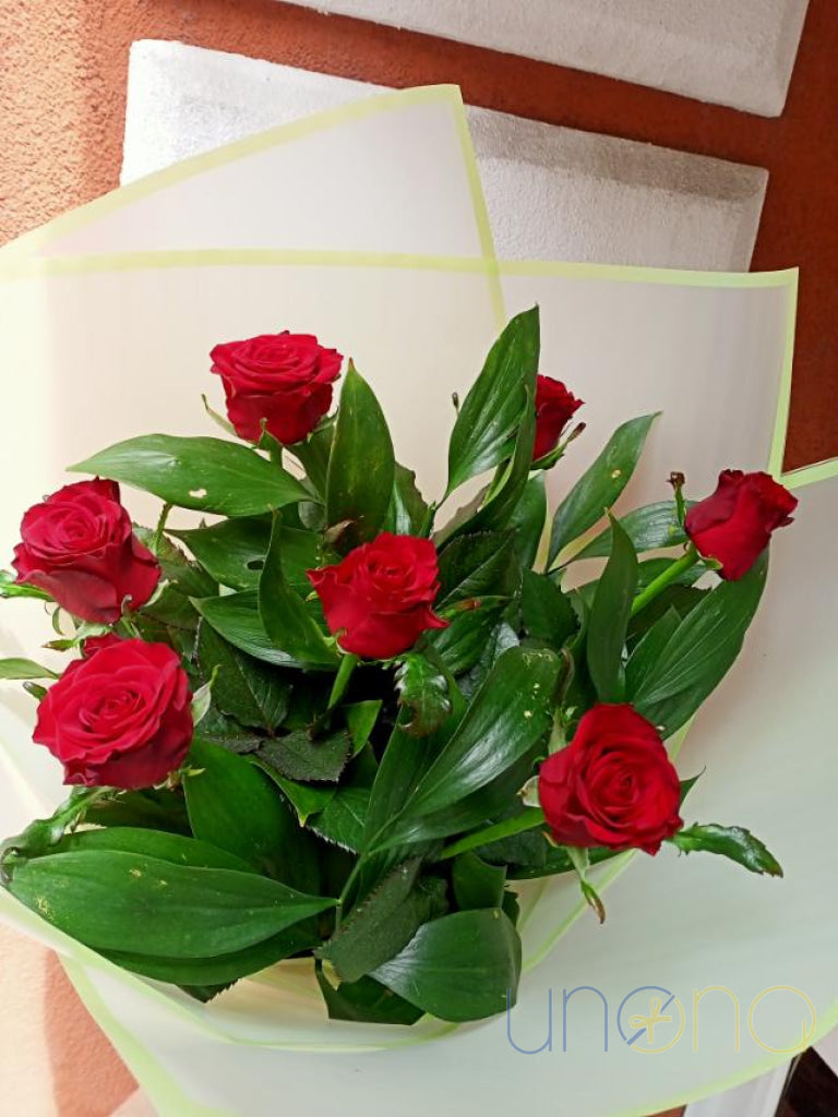 Fresh roses professionally arranged by local florists