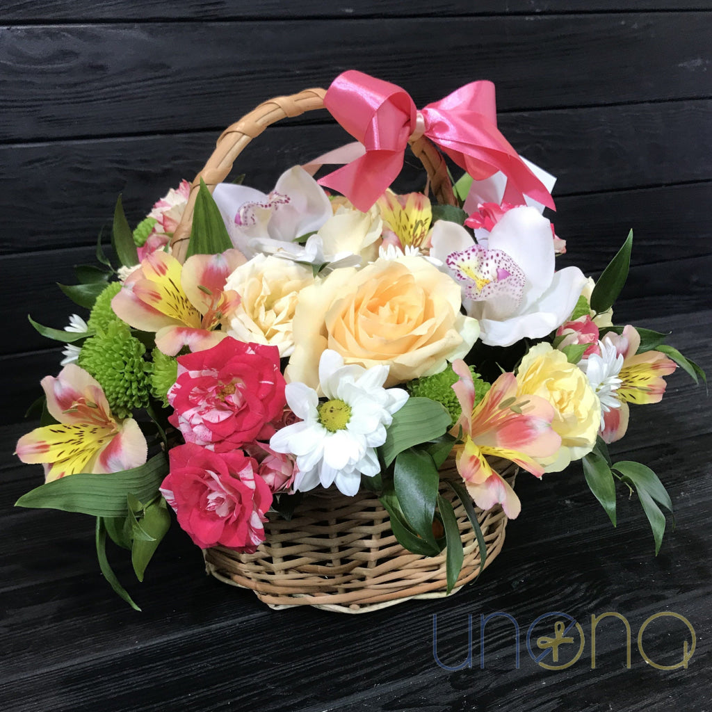 Romantic roses and orchids flower basket for a woman in Ukraine