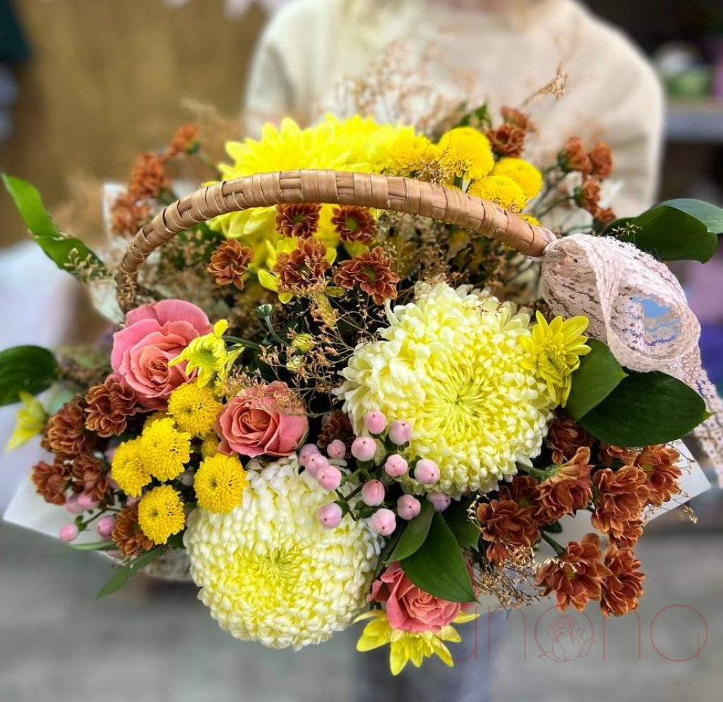 Fall chrysanthemum basket with roses orchids and greenery
