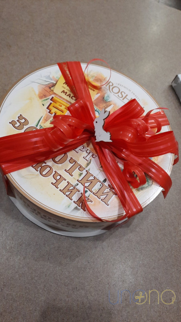 Classic Roshen Golden Key Cake with light and chocolate sponge layers