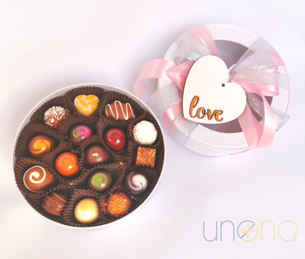 Luxury gift box with 16 handcrafted Belgian chocolates featuring gourmet fillings and elegant presentation