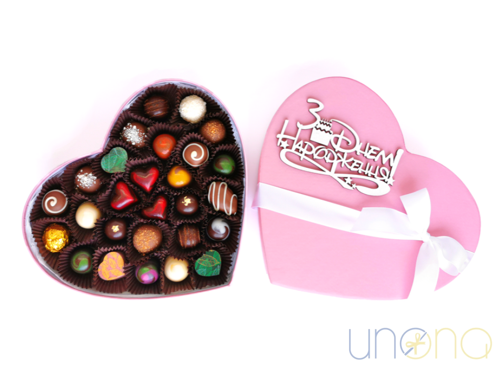 Elegant heart-shaped chocolate box with assorted handmade chocolates for Valentine's Day, Mother's Day, and anniversaries