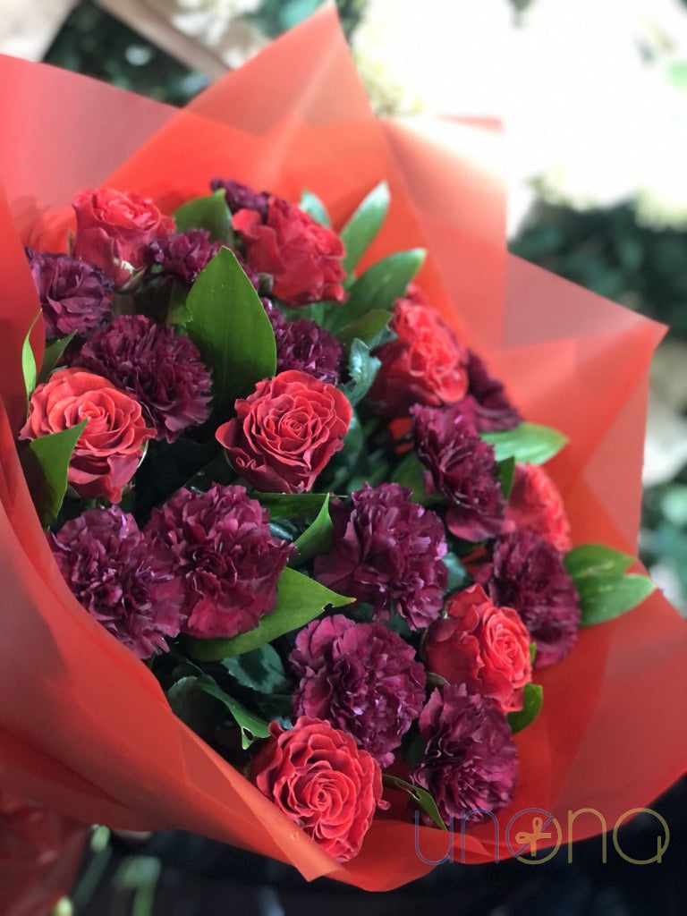 red roses and carnations bouquet in Ukraine