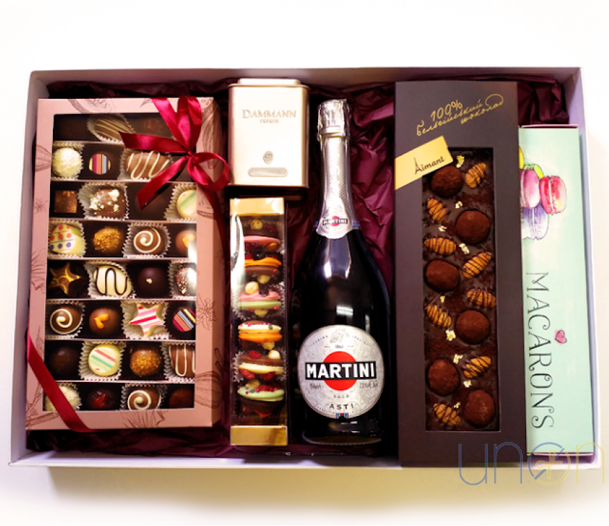 Luxury gourmet gift box with artisan chocolates, French macarons, premium tea, and Martini Asti for delivery in Ukraine