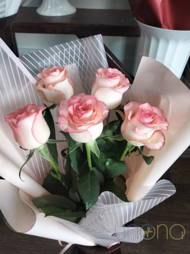 Local florist delivering fresh roses in Kharkiv Ukraine
