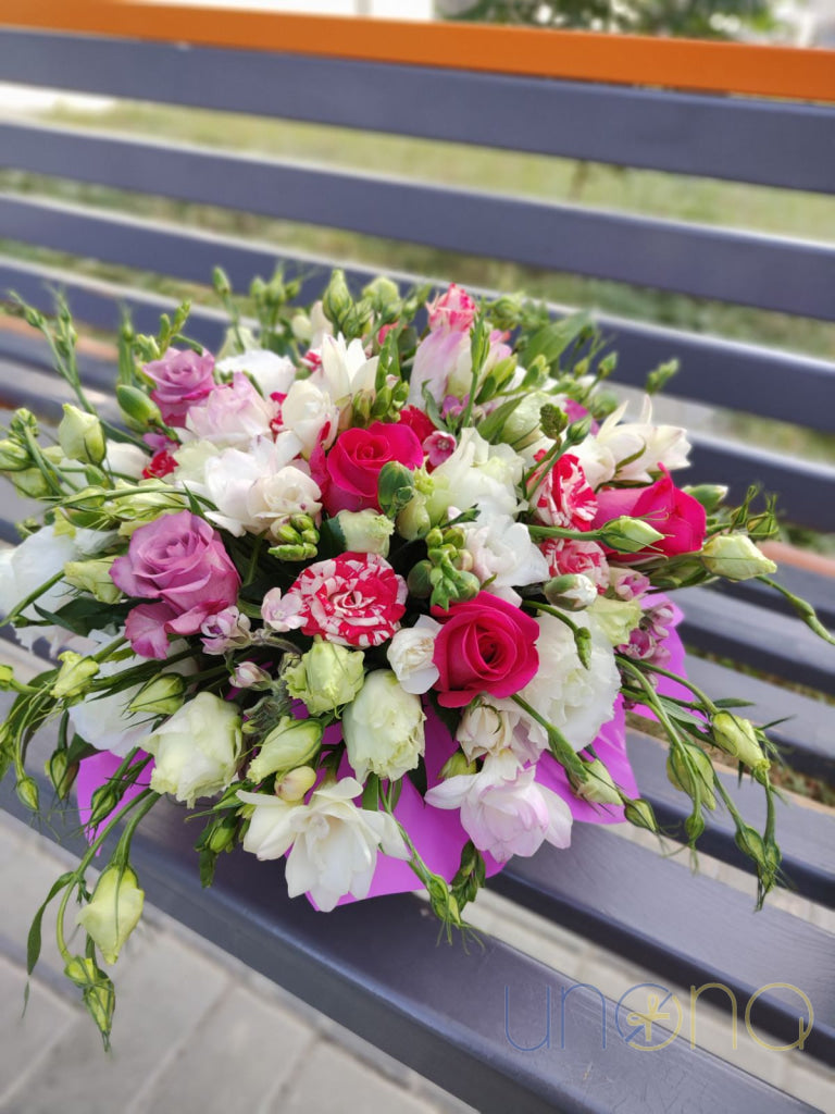 Fuchsia roses in One-Of-A-Kind Bouquet to send flowers to a Ukrainian woman